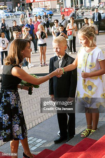 Princess Marie of Denmark receives a bouquet of flowers at her arrival to the international food summit "Better Food For More People" opening...