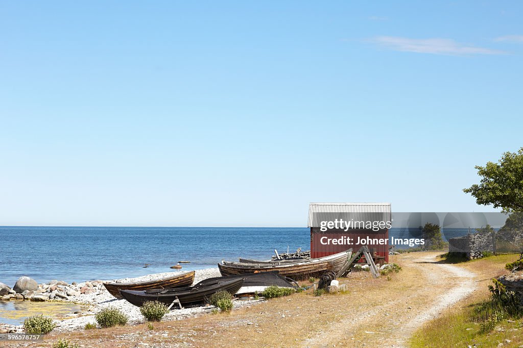 Boats and fishing shed at sea