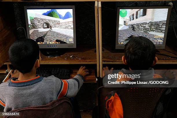 palestinian children playing video games. - palestinian boy stock pictures, royalty-free photos & images