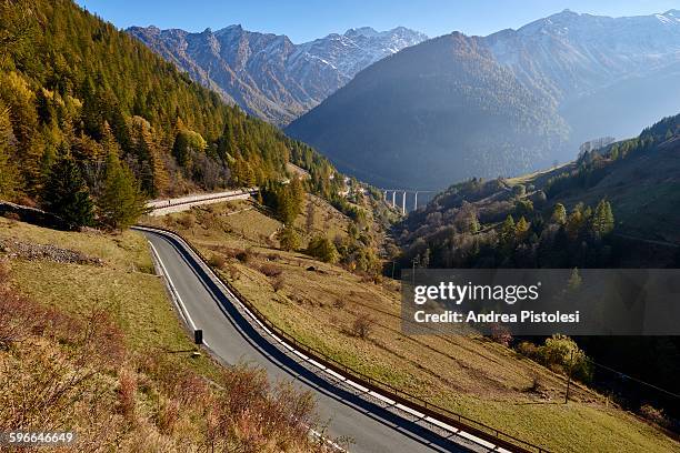 alps monutains and gran san bernardo road, italy - san bernardo foto e immagini stock