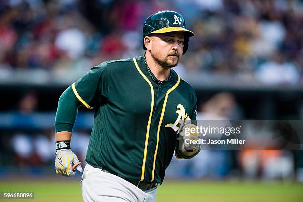 Billy Butler of the Oakland Athletics rounds the bases on a solo home run during the fourth inning against the Cleveland Indians at Progressive Field...