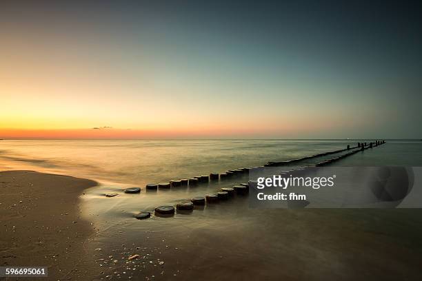 on the beach at baltic sea in germany - groyne stock pictures, royalty-free photos & images