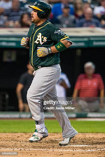 Billy Butler of the Oakland Athletics rounds the bases on a solo home run during the fourth inning against the Cleveland Indians at Progressive Field...