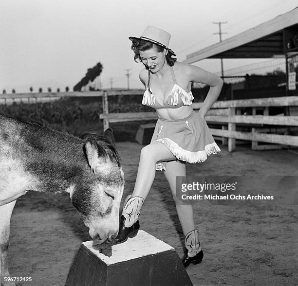 Betty Ames and her donkey Jackson perform in Los Angeles,California.