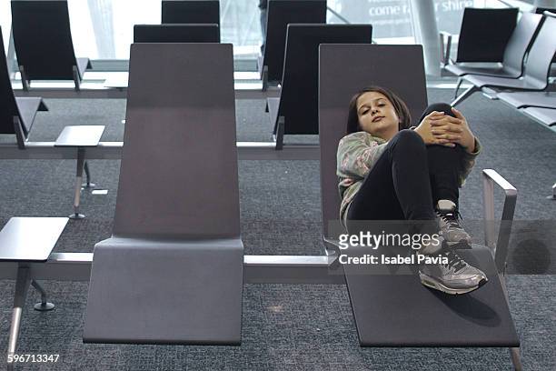 girl resting at the airport - bruselas stock pictures, royalty-free photos & images