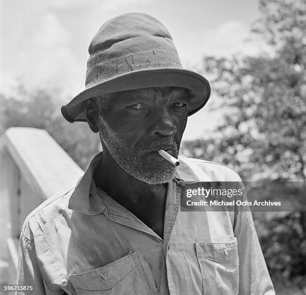 Local man poses with a cigarette in Charlotte Amalie, St. Thomas, US Virgin Islands.