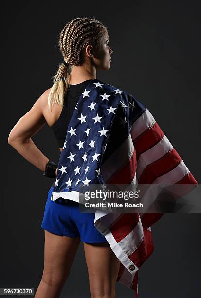 Paige VanZant of the United States poses for a post fight portrait backstage during the UFC Fight Night event at Rogers Arena on August 27, 2016 in...