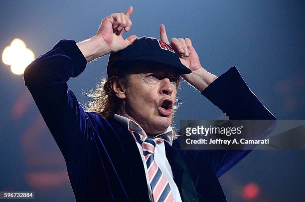 Angus Young performs with AC/DC during the Rock Or Bust Tour at the Greensboro Coliseum on August 27, 2016 in Greensboro, North Carolina.