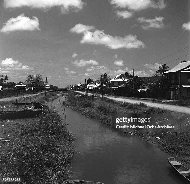 View local homes along a canal in Cayenne, French Guiana.