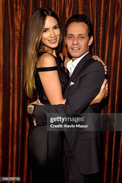 Shannon De Lima and Marc Anthony pose backstage at Radio City Music Hall on August 27, 2016 in New York City.