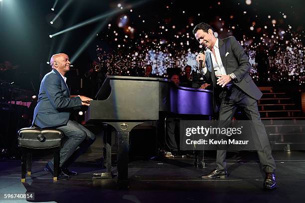 Sergio George performs onstage with Marc Anthony at Radio City Music Hall on August 27, 2016 in New York City.