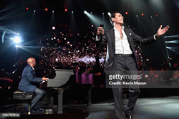 Sergio George performs onstage with Marc Anthony at Radio City Music Hall on August 27, 2016 in New York City.