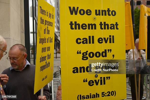 People participating in a demonstration against the Manchester Pride parade on August 27, 2016 in Manchester, England. The demonstration against the...