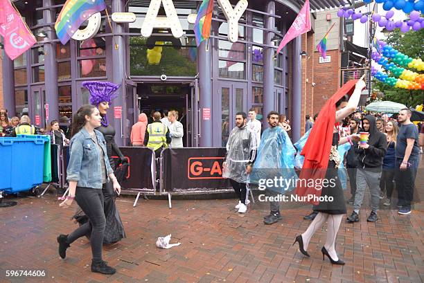 People attending Manchester Pride 2016 on August 27, 2016 in Manchester, England. The Manchester Pride events are to celebrate the variety of...