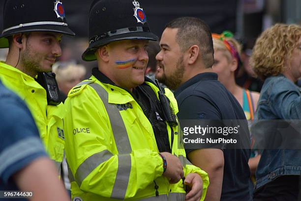 Police officer providing security at Manchester Pride 2016 on August 27, 2016 in Manchester, England. The Manchester Pride events are to celebrate...