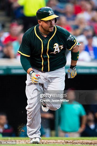 Billy Butler of the Oakland Athletics runs to first during the fourth inning against the Cleveland Indians at Progressive Field on July 29, 2016 in...
