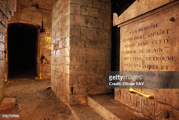 Funerary stele of Philibert Aspairt, a legendary character who was lost within the subterranean quarries of Paris and died in 1793. The stele is...