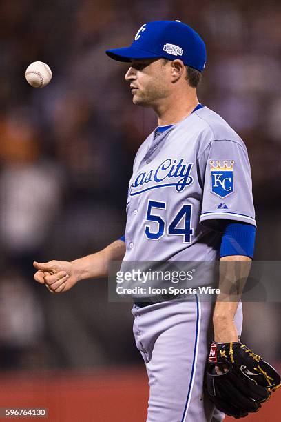 Kansas City Royals relief pitcher Jason Frasor reacts in frustration after letting a run in, in the 5th inning during game 4 of the World Series...
