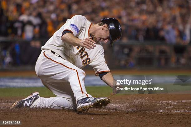 San Francisco Giants second baseman Matt Duffy scores on a single by Poser, in the 3rd inning during game 4 of the World Series between the San...