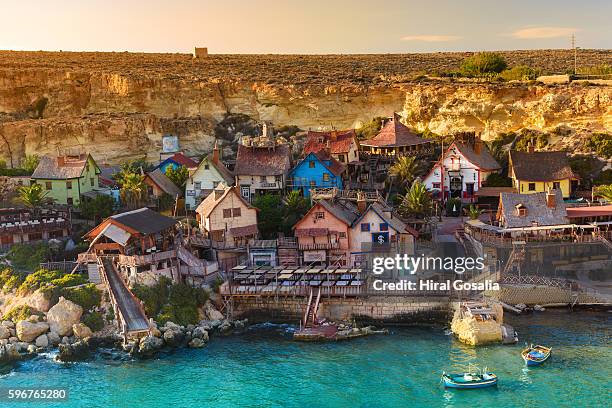 popeye village - malta boat stock pictures, royalty-free photos & images