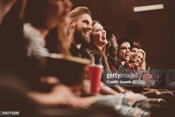 gruppe von menschen im kino - movie theatre audience stock-fotos und bilder