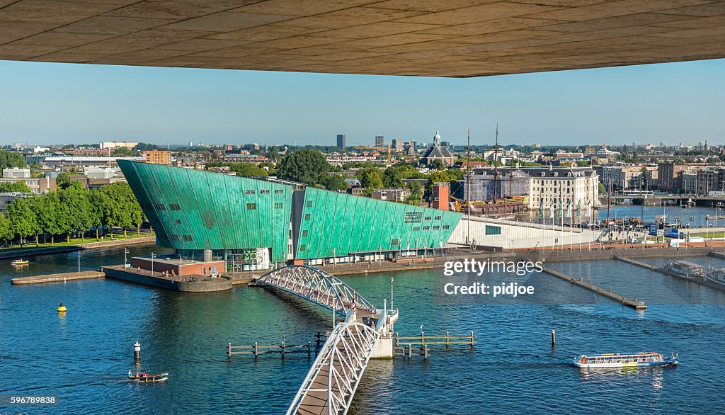 Harbour of Amsterdam with in the front the museum Nemo