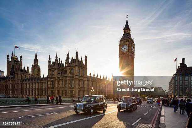 london at sunset - london taxi ストックフォトと画像