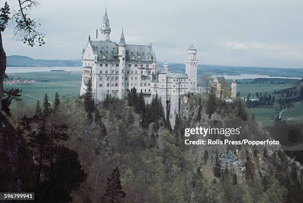 View of Neuschwanstein Castle, built by King Ludwig II of Bavaria as a private retreat, located near the Alpine town of Fussen in Bavaria, southern...