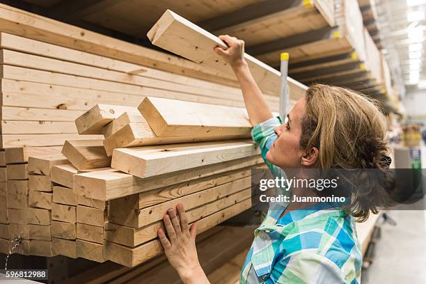 shopping for timber/lumber - collecting wood stock pictures, royalty-free photos & images