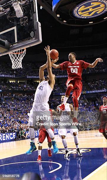 March 15, 2015 Arkansas Razorbacks guard Rashad Madden blocks a shot during the 2015 SEC Men's Basketball Championship finals between Kentucty and...