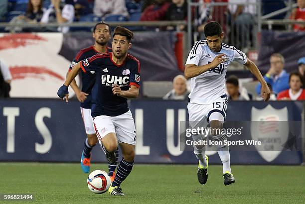 New England Revolution midfielder Lee Nguyen chased by Vancouver Whitecaps midfielder Matias Laba . The Vancouver Whitecaps defeated the New England...