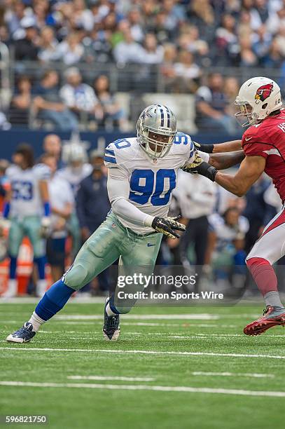 Dallas Cowboys defensive end DeMarcus Lawrence rushes around Arizona Cardinals tight end Rob Housler during a football game between the Dallas...