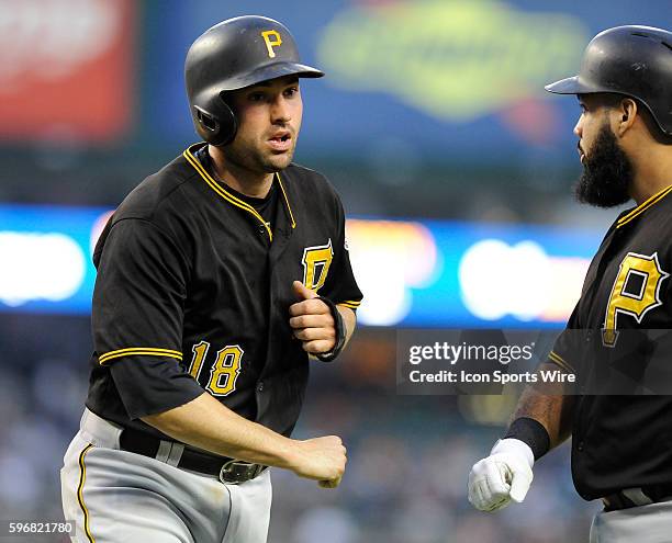 Wednesday, July 1, 2015: Pittsburgh Pirates Second base Neil Walker [4964] fist bumps teammate Pittsburgh Pirates First base Pedro Alvarez [6864]...