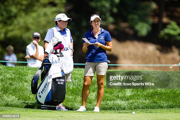 Marina Alex checks her score card on the 9th green during the second round of the 2015 U.S. Women's Open at Lancaster Country Club in Lancaster, PA.
