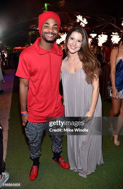 Actor King Bach and model Amanda Cerny attend the annual Midsummer Night's Dream party hosted by Hugh Hefner at The Playboy Mansion on August 27,...