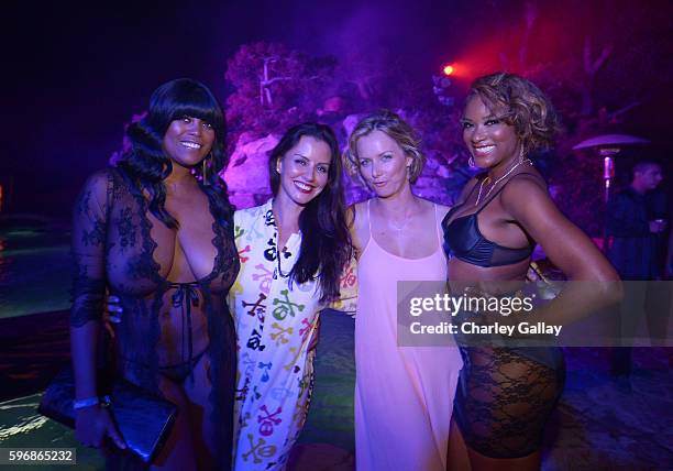Playmates Quiana Chase, Pennelope Jimenez, Marketa Janska and Serria Tawan attend the annual Midsummer Night's Dream party hosted by Hugh Hefner at...