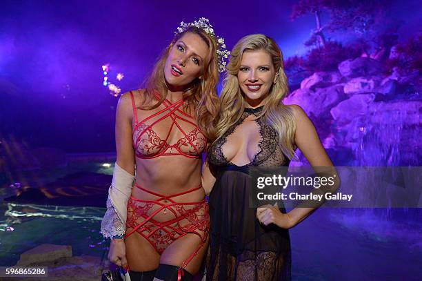 Playmates Gia Marie and Stephanie Branton attend the annual Midsummer Night's Dream party hosted by Hugh Hefner at The Playboy Mansion on August 27,...