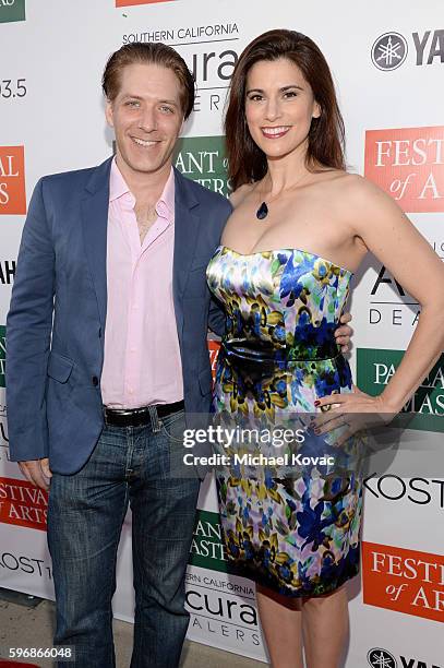 Actress Milena Govich and writer David Cornue attend the Festival of Arts Celebrity Benefit Concert and Pageant on August 27, 2016 in Laguna Beach,...