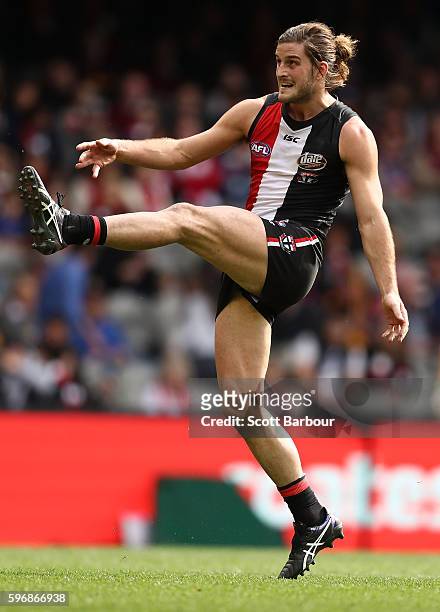 Josh Bruce of the Saints kicks a goal during the round 23 AFL match between the St Kilda Saints and the Brisbane Lions at Etihad Stadium on August...