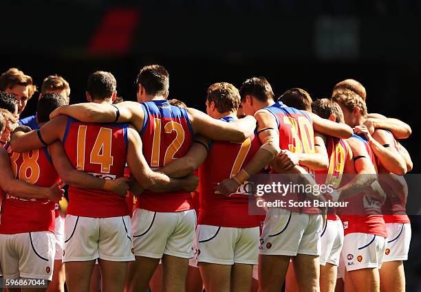 The Lions form a huddle during the round 23 AFL match between the St Kilda Saints and the Brisbane Lions at Etihad Stadium on August 28, 2016 in...