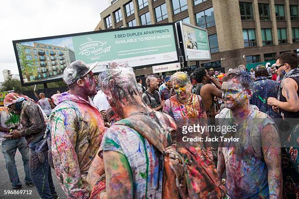Revellers take part in the J'Ouvert celebrations on Family Day of the Notting Hill Carnival on August 28, 2016 in London, England. The Notting Hill...