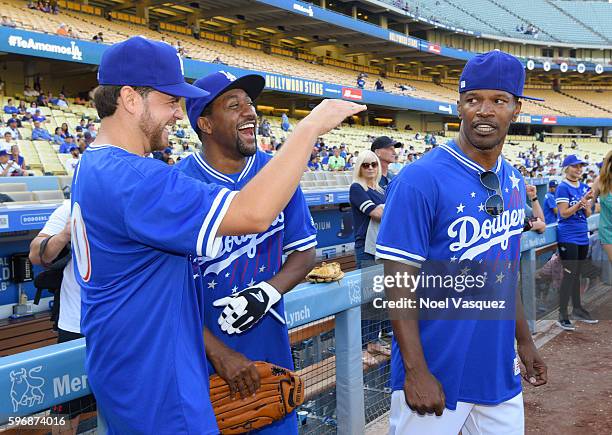 Dave Osokow, Jaleel White and Jamie Foxx attend the Hollywood Stars game at Dodger Stadium on August 27, 2016 in Los Angeles, California.