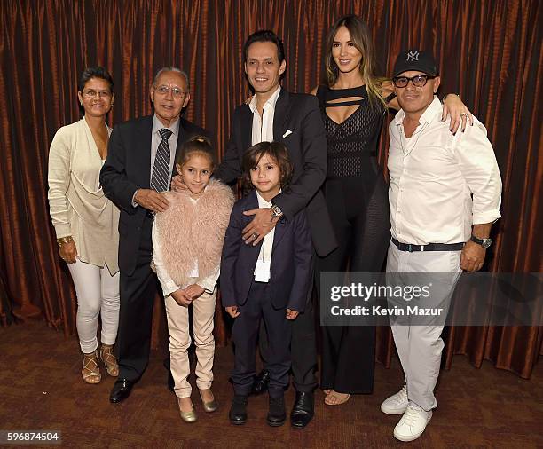 Yolanda Muniz, Felipe Muniz, Emme Muniz, Marc Anthony, Max Muniz, Shannon De Lima, and Bigram Zayas pose backstage at Radio City Music Hall on August...