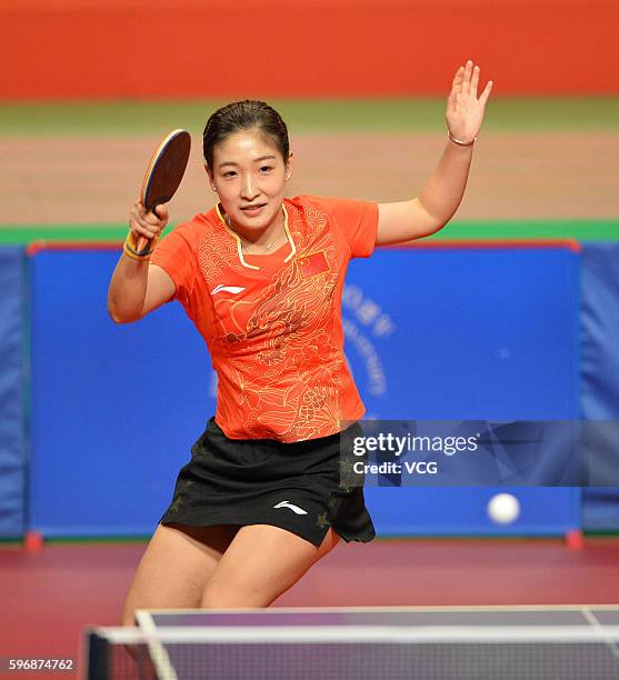 Table tennis player Liu Shiwen performs during a demonstration on August 28, 2016 in Hong Kong, China. Chinese Mainland Olympians visit Hong Kong and...