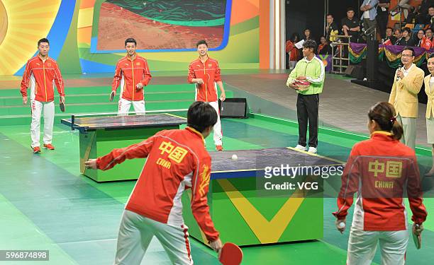 Chinese table tennis players perfom during a demonstration on August 28, 2016 in Hong Kong, China. Chinese Mainland Olympians visit Hong Kong and...