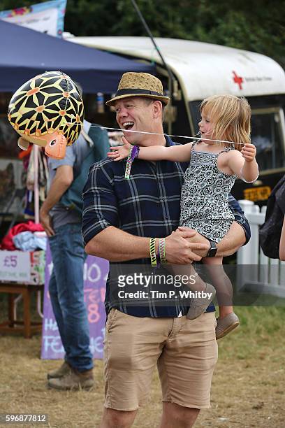Mike Tindall and his daughter Mia Tindall during day three of The Big Feastival at Alex James' Farm on August 28, 2016 in Kingham, Oxfordshire.