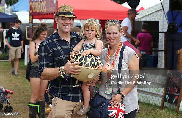 Mike Tindall, Zara Tindell and their daughter Mia Tindall pose for a photograph during day three of The Big Feastival at Alex James' Farm on August...