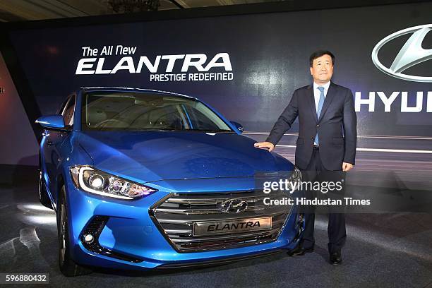 Hyundai Motor India MD and CEO YK Koo poses during the launch of new sixth generation premium sedan Elantra car at Taj Palace, on August 23, 2016 in...