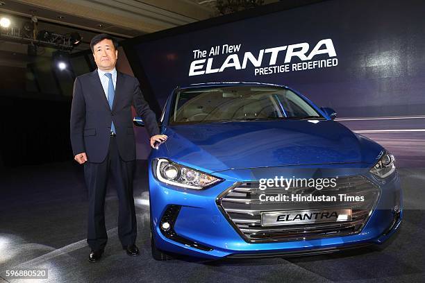 Hyundai Motor India MD and CEO YK Koo poses during the launch of new sixth generation premium sedan Elantra car at Taj Palace, on August 23, 2016 in...