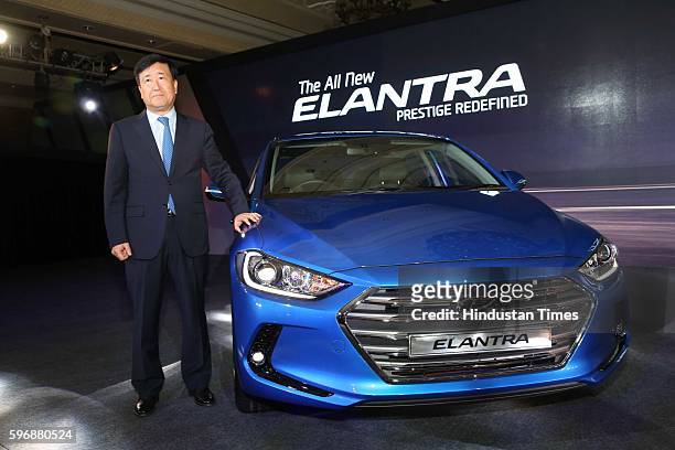 Hyundai Motor India MD and CEO YK Koo poses during the launch of new sixth generation premium sedan Elantra car at Taj Palace, on August 23, 2016 in...